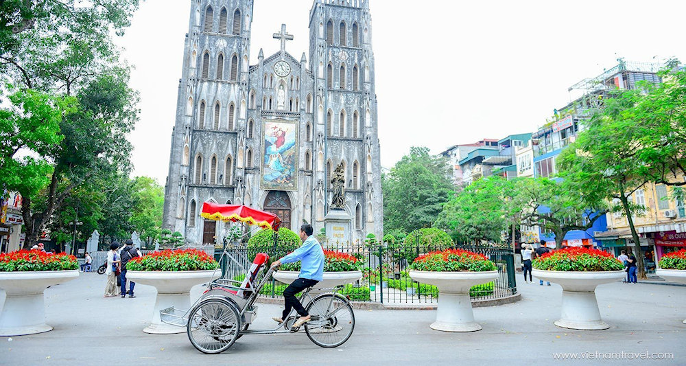 Explore Hanoi’s Old Quarter by cyclo, passing historic buildings, temples, and ancient houses while experiencing daily life up close